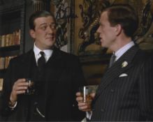 Stephen Fry signed Jeeves and Wooster 10x8 colour photo. Stephen John Fry (born 24 August 1957) is