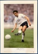 Ossie Ardiles signed 23x17 Tottenham Hotspur blue tube print picture in action during the 1981 FA
