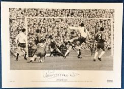 Jimmy Greaves signed 23x17 black and white print pictured in action for Tottenham Hotspur against