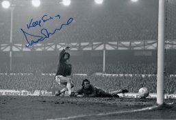 Autographed Duncan McKenzie 12 X 8 Photo - B/W, Depicting McKenzie Scoring Past Aston Villa