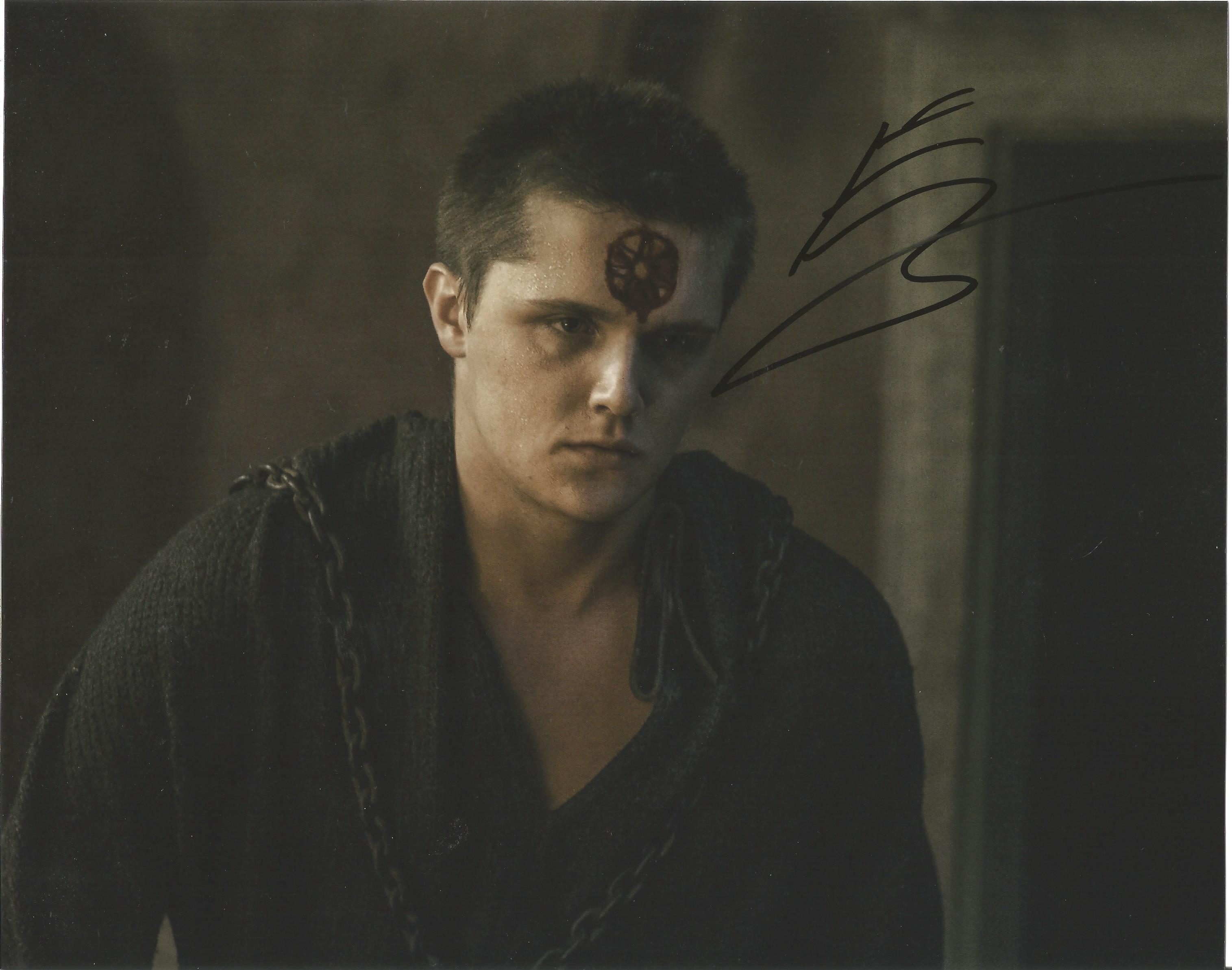 Eugene Simon signed 10x8 colour photo. Good condition. All autographs come with a Certificate of