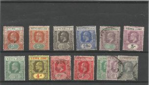 Seychelles and Sierra Leone pre 1936 stamps on stockcard. 13 stamps. Good condition. We combine