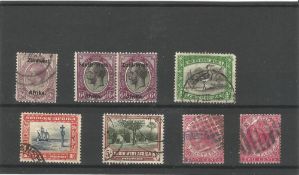 SW Africa, Straits settlement pre 1936 stamps on stockcard. 8 stamps. Good condition. We combine