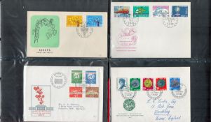 First Day Cover Album Green with approx 100 Swiss (Helvetia) FDCs from 1966 to 1976 plus