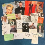 TV Entertainment Collection of 25 Signatures on various items such as photos, paper, flyers.