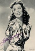 Loretta Young signed 6x4 vintage black and white postcard photo. Loretta Young (born Gretchen Young;
