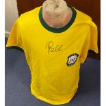 Pele Handsigned Retro 1970's Brazil Shirt. Signature states 'Pele' Yellow and Green in Colour,