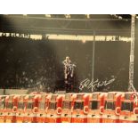 Evel Knievel 20x16 signed colour print pictured during his jump at Wembley Stadium in 1975. Robert