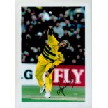 Shane Warne signed 12x8 colour photo pictured in action for Australia. Good condition. All