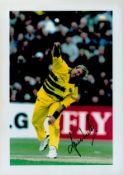 Shane Warne signed 12x8 colour photo pictured in action for Australia. Good condition. All
