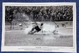 Football, Tom Finney signed 12x18 black and white photograph picturing the iconic Splash Down as