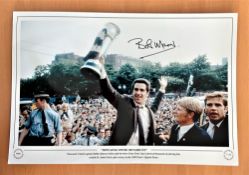 Football, Bobby Moncur signed 12x18 colour photo. Pictured as he holds the 1969 Fairs Cup in front