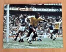 Football, Jairzinho signed 12x16 colour photo. Pictured in action whilst playing for Brazil in the