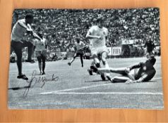 Football, Jairzinho signed 12x16 black and white photo. Pictured during the 1970 World Cup match