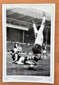 Football, Alex Dawson signed 12x18 black and white photo. Pictured as he celebrates scoring the