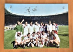 Football, Billy Bonds signed 16x12 inch colour photo. Pictured celebrating with West Ham after