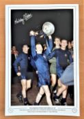 Football, Nobby Stiles signed 12x18 colour photo Pictured as he proudly celebrates with the 1968