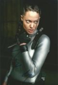 Angelina Jolie signed Tomb Raider 12x8 colour photo. Angelina Jolie DCMG ( born June 4, 1975) is