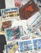 Assorted stamp collection in bags. Assorted world stamps, GB and BCW. Assorted on and off backing