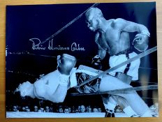 Boxing, Ruben 'Hurricane' Carter signed 16x12 black and white photograph pictured during a fight
