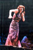 Kate Bush signed 12x8 colour photo. Catherine Bush CBE (born 30 July 1958) is an English singer,