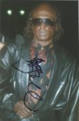 Music, Miles David signed 8 x6 colour photograph signed in Cologne a few weeks before he died. Miles