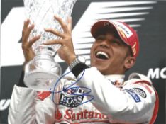 Lewis Hamilton signed 12x8 colour photo. British racing driver. He currently competes in Formula One