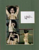 Bjork 13x10 overall mounted signature piece includes signed album page and risque montage photo.