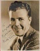 Dick Powell signed 14x11 vintage black and white photo. Richard Ewing Powell (November 14, 1904 -