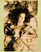 Claudia Christian signed 14x11 black and white photo. Claudia Christian (born Claudia Ann Coghlan;