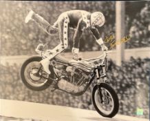 Evel Knievel signed 20x16 black and white photo picturing the legendary stuntman in action. Good