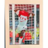 Ian Wright signed 19x15 mounted colour photo pictured during his playing days with Arsenal. Good