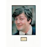 Stephen Fry small signature piece mounted below colour photo. Approx size 16x12. Good condition. All