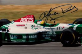 F1 Legend David Coulthard Hand signed 6x4 Colour Photo. Photo shows Coulthard in his younger days