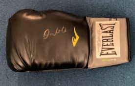Boxing Dwight Muhammad QAWI signed 14OZ Black Everlast Glove. Dwight Muhammad Qawi (born Dwight