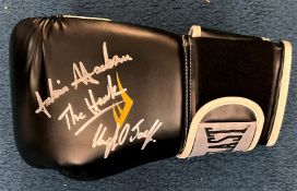 Boxing Julian Jackson and his son Clayton signed Everlast black glove. Signatures obtained at the