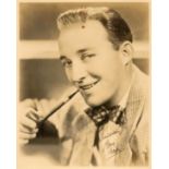 Bing Crosby signed 10x8 vintage sepia photo with original personalised mailing envelope dated 1930s.