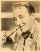 Bing Crosby signed 10x8 vintage sepia photo with original personalised mailing envelope dated 1930s.