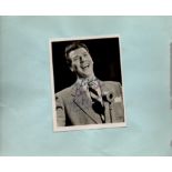 Max Bygraves signed small black and white photo attached to album page. Dedicated. Est.