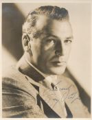 Gary Cooper signed 9x7 vintage sepia photo with original mailing envelope dated 26th March 1939.