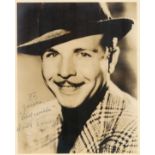 Dick Powell signed 10x8 sepia vintage photo dedicated with original Warner Bros mailing envelope