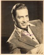John Howard signed 10x8 vintage sepia photo in original Paramount Pictures mailing envelope dated 23