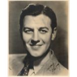 John King signed 10x8 vintage sepia photo with original mailing envelope dated 27 April 1938.