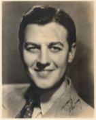 John King signed 10x8 vintage sepia photo with original mailing envelope dated 27 April 1938.