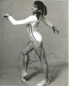 Nadia Comaneci signed 10x8 black and white photo. Romanian retired gymnast and a five-time Olympic