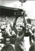 Pele signed 12x8 black and white photo.Good condition. All autographs come with a Certificate of