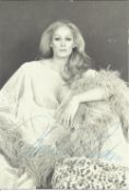 Ursula Andress signed 6x4 black and white photo rare image. Ursula Andress (born 19 March 1936) is a