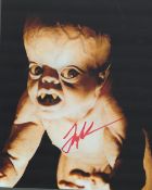 Director, Larry Cohen signed 10x8 colour Its Alive photograph picturing Rick Baker's baby design