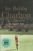 Football legend, Bobby Charlton signed hardback book titled My England Years. This beautiful