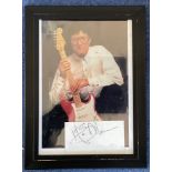 Singer, Hank Marvin 14x10 framed signature piece featuring a colour photograph of the musician